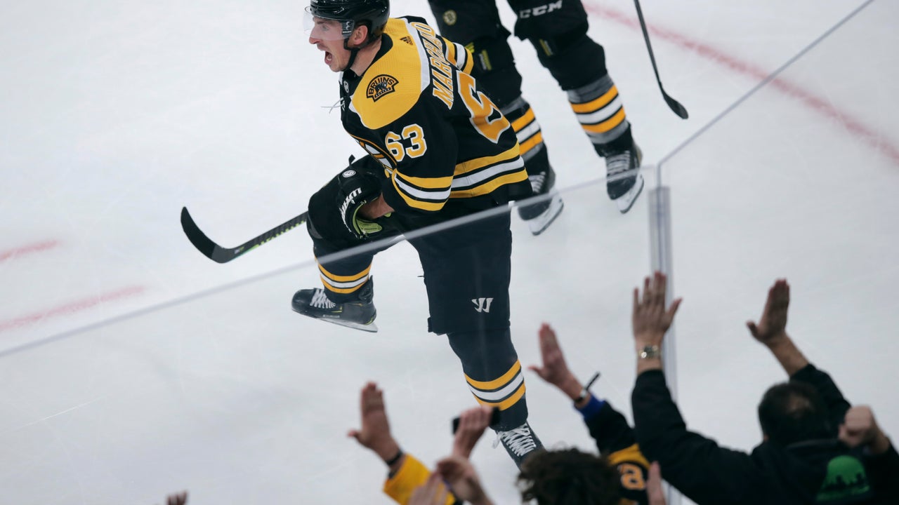 Marchand's 2 goals, 3 assists carry Bruins to 6-4 win